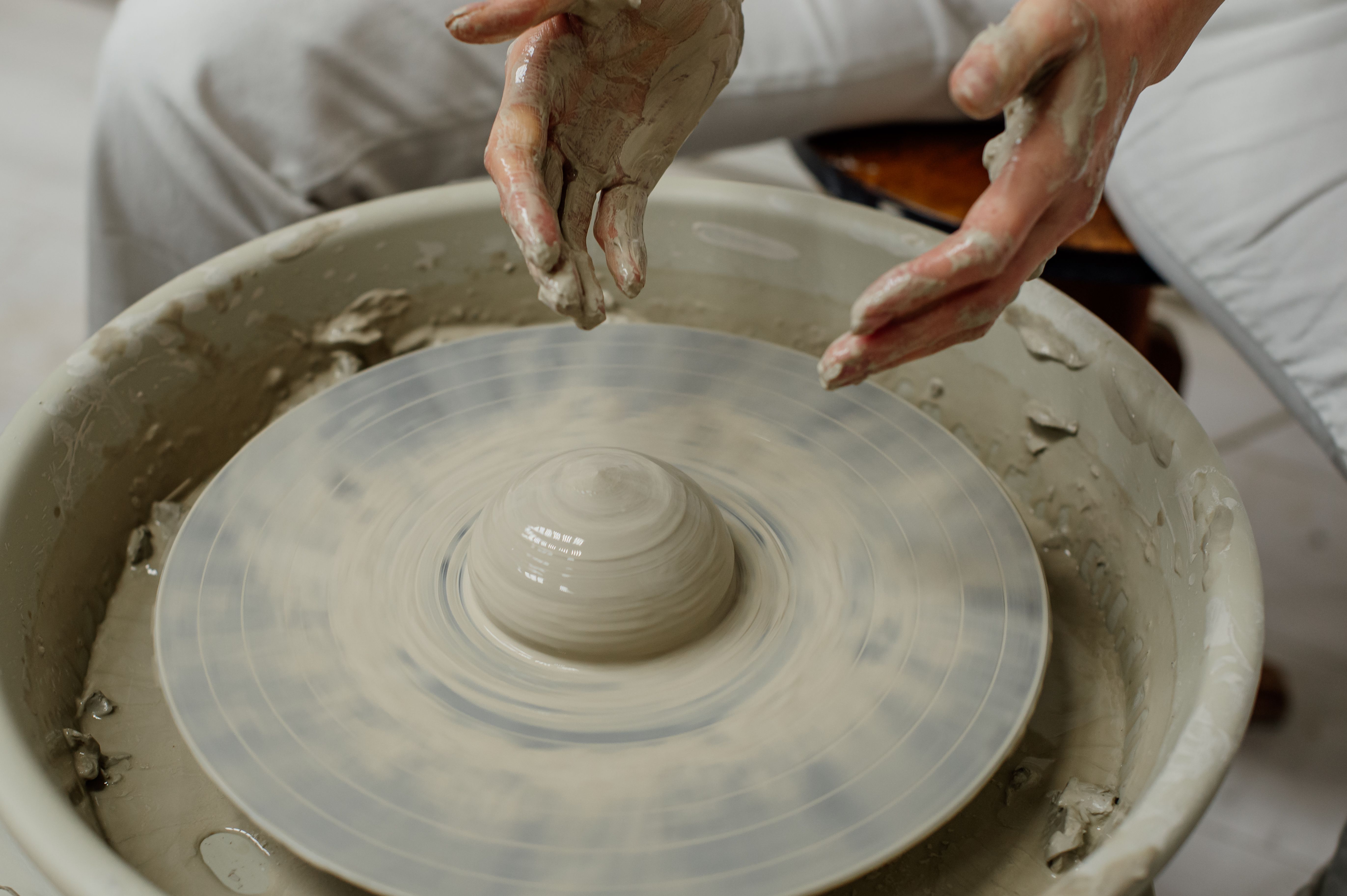 Throwing a mug on the wheel